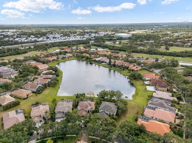 7521 Aralia Way, Seminole, FL 33777 - aerial view of property and surrounding area with nearby suburban area and a large body of water