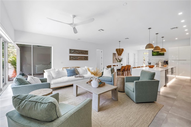 2065 Goldenrod St, Sarasota, FL 34239 - living room featuring a ceiling fan and recessed lighting