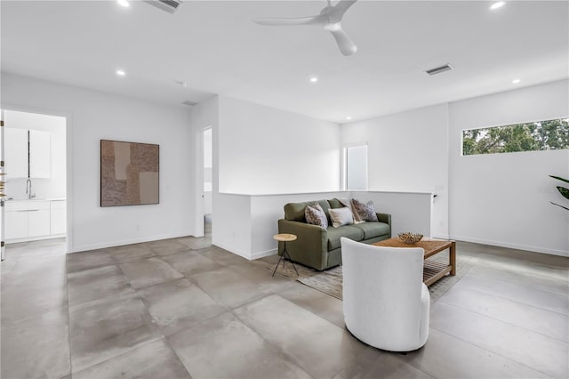 2065 Goldenrod St, Sarasota, FL 34239 - living area featuring recessed lighting, concrete floors, and a ceiling fan