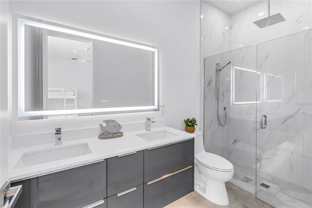 2065 Goldenrod St, Sarasota, FL 34239 - full bath featuring a marble finish shower and double vanity