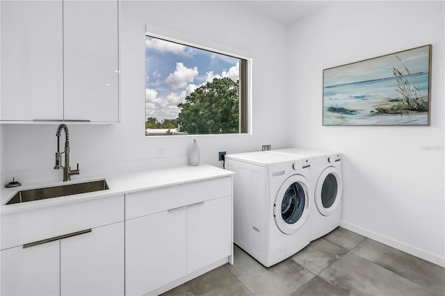 2065 Goldenrod St, Sarasota, FL 34239 - washroom featuring cabinet space and washing machine and clothes dryer