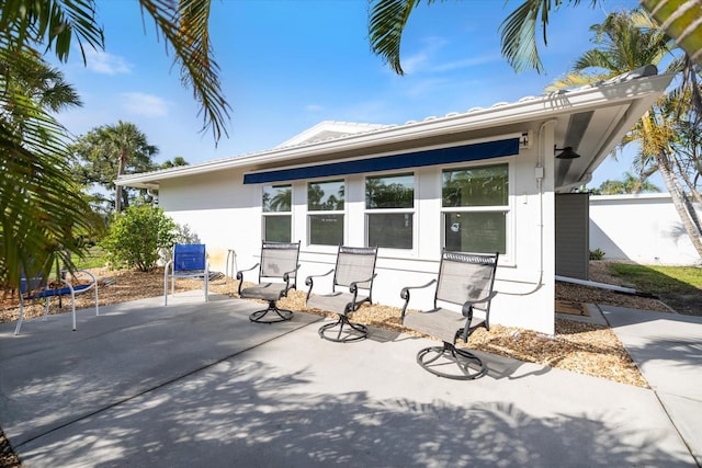107 Clipper Way Unit 107, Nokomis, FL 34275 - rear view of property with a patio