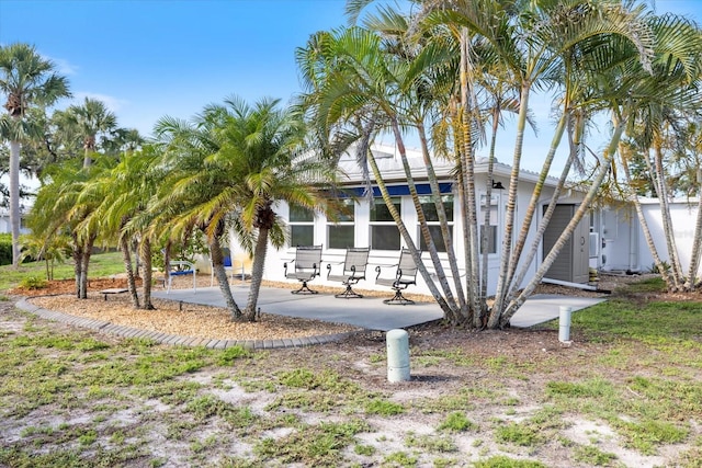 107 Clipper Way Unit 107, Nokomis, FL 34275 - rear view of house with a patio