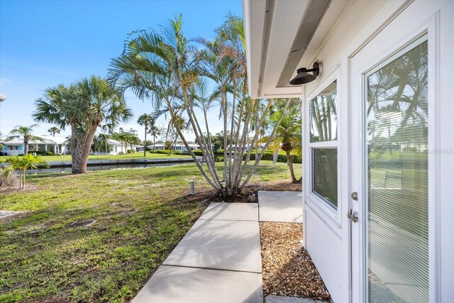 107 Clipper Way Unit 107, Nokomis, FL 34275 - view of grassy yard with a water view