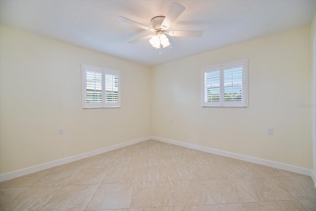 107 Clipper Way Unit 107, Nokomis, FL 34275 - empty room featuring a ceiling fan and baseboards