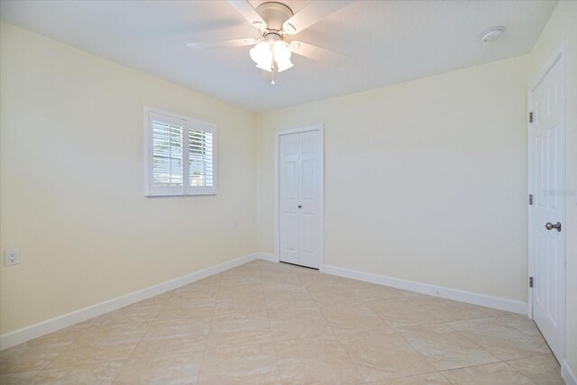 107 Clipper Way Unit 107, Nokomis, FL 34275 - empty room with a smoke detector and ceiling fan