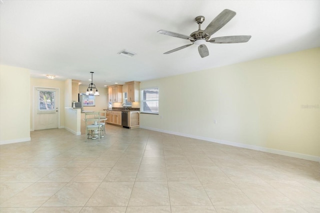 107 Clipper Way Unit 107, Nokomis, FL 34275 - unfurnished living room with healthy amount of natural light and ceiling fan