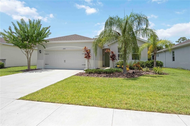 13804 Woodbridge Ter, Lakewood Ranch, FL 34211 - single story home featuring an attached garage, driveway, a front yard, and stucco siding