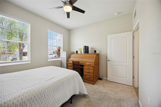 13804 Woodbridge Ter, Lakewood Ranch, FL 34211 - bedroom with light carpet and a ceiling fan