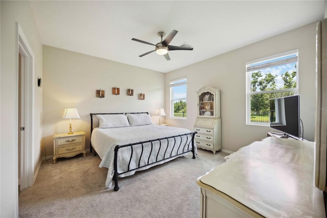 13804 Woodbridge Ter, Lakewood Ranch, FL 34211 - bedroom featuring light carpet and ceiling fan