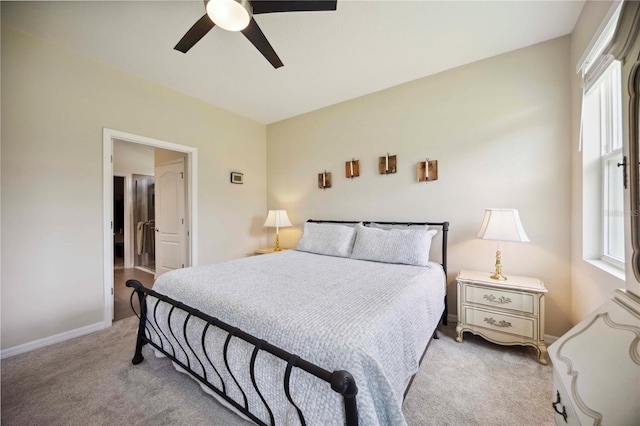 13804 Woodbridge Ter, Lakewood Ranch, FL 34211 - bedroom with multiple windows, light colored carpet, and ceiling fan