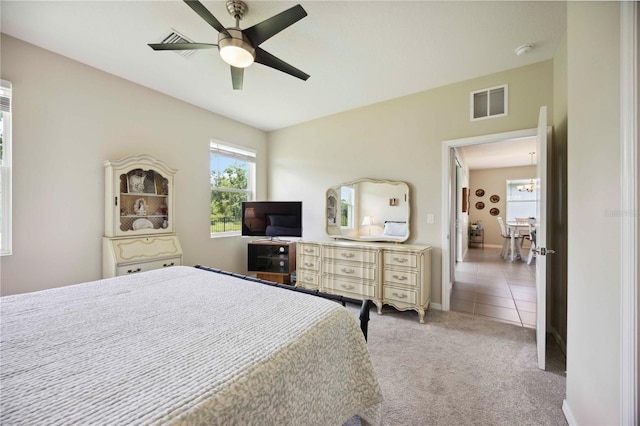 13804 Woodbridge Ter, Lakewood Ranch, FL 34211 - bedroom featuring light carpet and a ceiling fan