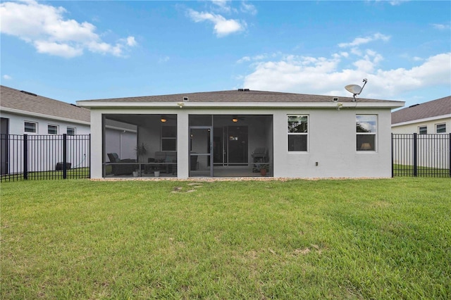 13804 Woodbridge Ter, Lakewood Ranch, FL 34211 - rear view of house featuring a fenced backyard, a sunroom, and stucco siding