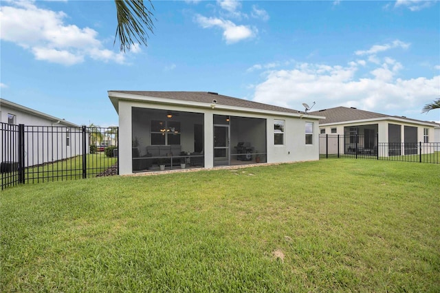 13804 Woodbridge Ter, Lakewood Ranch, FL 34211 - back of property featuring a sunroom, a fenced backyard, and stucco siding