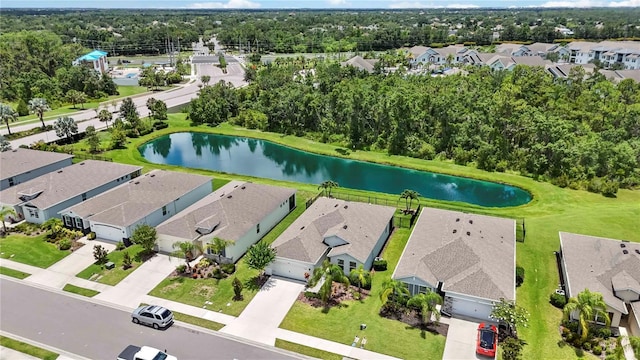 13804 Woodbridge Ter, Lakewood Ranch, FL 34211 - aerial view of residential area featuring a large body of water and a tree filled landscape