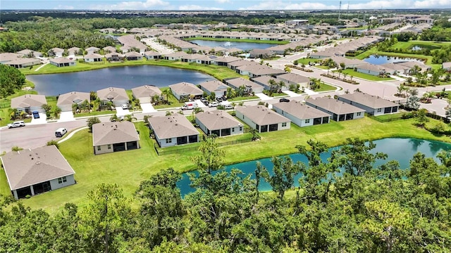 13804 Woodbridge Ter, Lakewood Ranch, FL 34211 - aerial perspective of suburban area featuring a large body of water