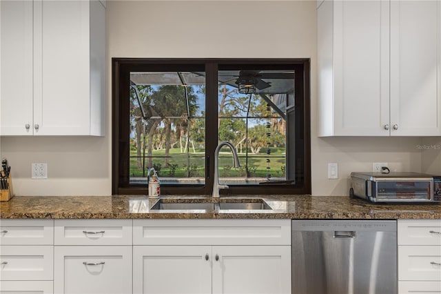 3658 Torrey Pines Way, Sarasota, FL 34238 - kitchen featuring dishwasher, a ceiling fan, white cabinetry, and dark stone counters