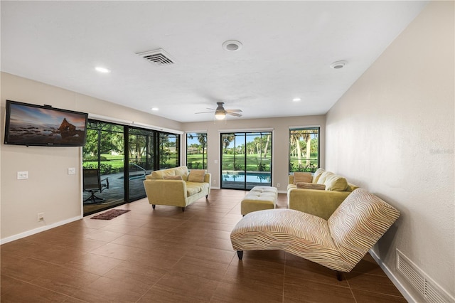 3658 Torrey Pines Way, Sarasota, FL 34238 - living room with ceiling fan and recessed lighting