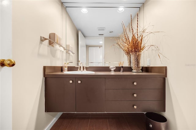 3658 Torrey Pines Way, Sarasota, FL 34238 - bathroom with vanity and wood finished floors