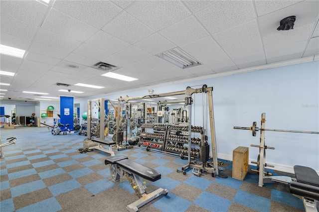 3658 Torrey Pines Way, Sarasota, FL 34238 - exercise room featuring a paneled ceiling and carpet
