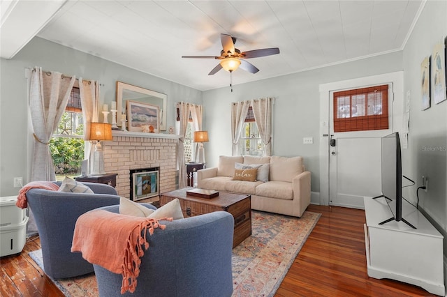 403 29th St NW, Bradenton, FL 34205 - living area with ceiling fan, hardwood / wood-style floors, and a brick fireplace