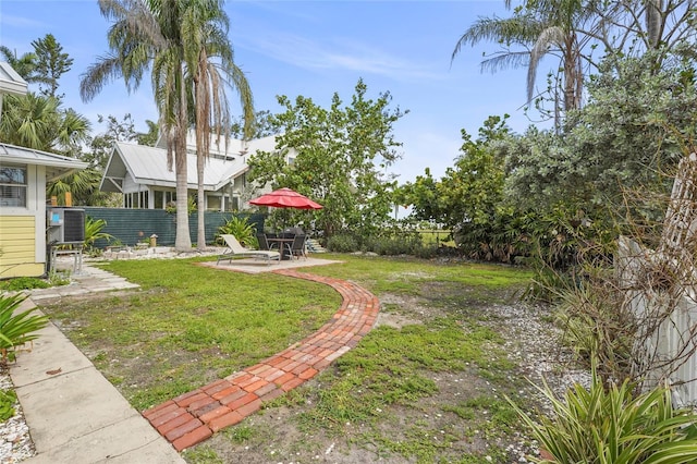 403 29th St NW, Bradenton, FL 34205 - fenced backyard with a patio area