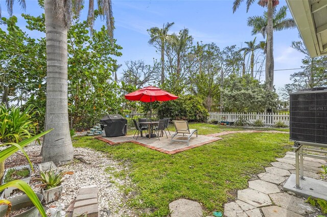 403 29th St NW, Bradenton, FL 34205 - fenced backyard featuring a patio