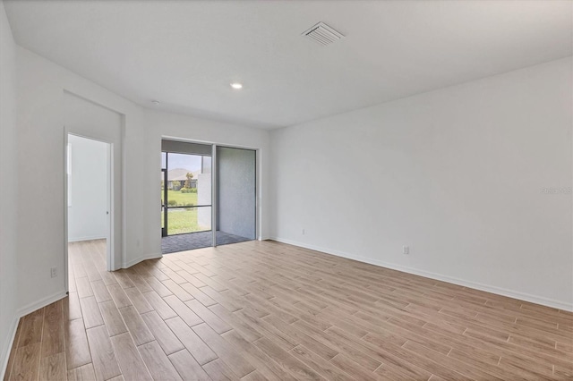 17823 Cherished Loop, Bradenton, FL 34211 - unfurnished room featuring light wood-style floors and recessed lighting