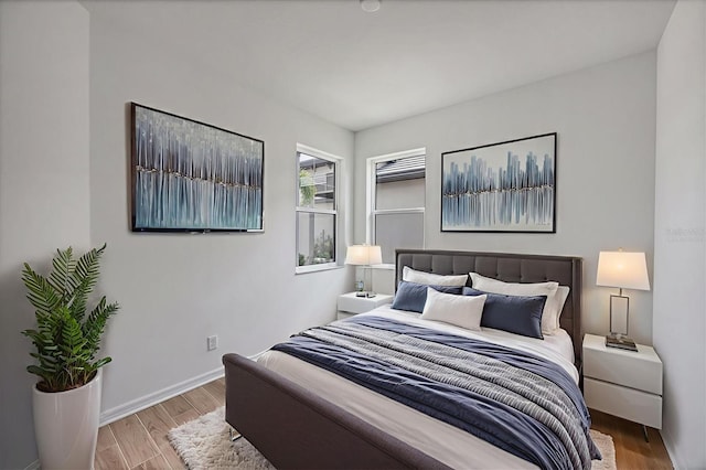 17823 Cherished Loop, Bradenton, FL 34211 - bedroom with wood finished floors and baseboards