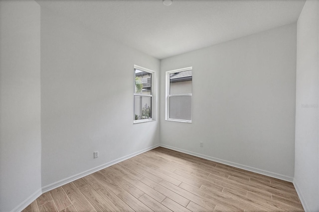 17823 Cherished Loop, Bradenton, FL 34211 - spare room featuring light wood-type flooring and baseboards