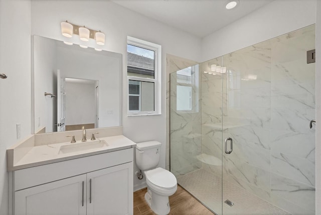 17823 Cherished Loop, Bradenton, FL 34211 - full bath featuring wood finished floors, a marble finish shower, and vanity