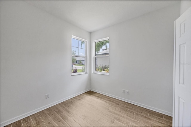 17823 Cherished Loop, Bradenton, FL 34211 - unfurnished room with light wood-type flooring
