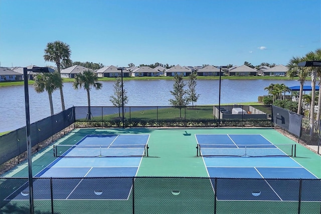 17823 Cherished Loop, Bradenton, FL 34211 - view of tennis court featuring a residential view and a water view