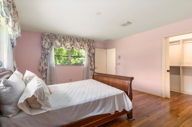 1541 Flower Dr, Sarasota, FL 34239 - bedroom with wood finished floors and baseboards