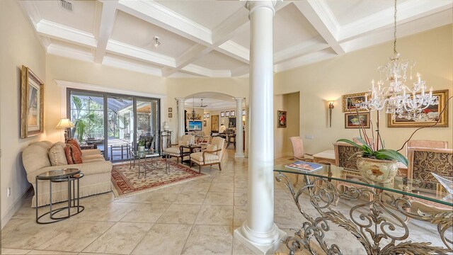 8832 Enclave Ct, Sarasota, FL 34238 - entrance foyer with decorative columns, arched walkways, coffered ceiling, beam ceiling, and a chandelier