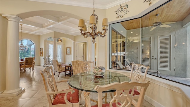 8832 Enclave Ct, Sarasota, FL 34238 - dining space with arched walkways, a chandelier, light tile patterned flooring, decorative columns, and beamed ceiling