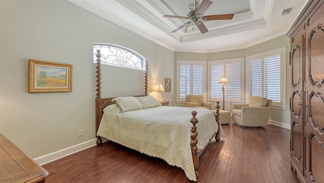 8832 Enclave Ct, Sarasota, FL 34238 - bedroom featuring a raised ceiling, dark wood-style floors, crown molding, and ceiling fan