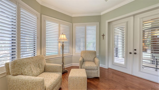 8832 Enclave Ct, Sarasota, FL 34238 - sitting room featuring wood finished floors, french doors, and ornamental molding