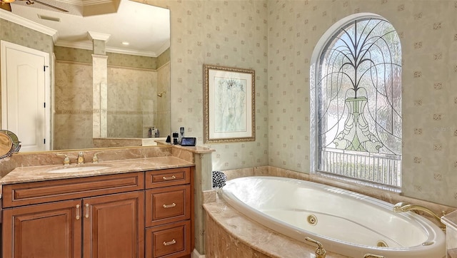 8832 Enclave Ct, Sarasota, FL 34238 - full bath with a tub with jets, wallpapered walls, vanity, and crown molding