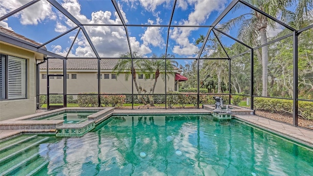 8832 Enclave Ct, Sarasota, FL 34238 - view of swimming pool featuring a lanai, a pool with connected hot tub, and a patio area