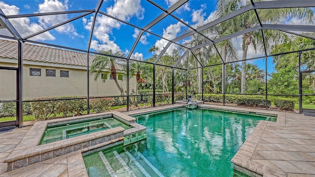 8832 Enclave Ct, Sarasota, FL 34238 - view of pool with a pool with connected hot tub, a patio area, and glass enclosure