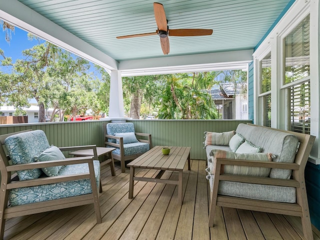 1732 6th St, Sarasota, FL 34236 - wooden terrace with an outdoor hangout area and a ceiling fan