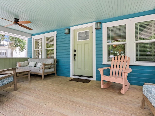 1732 6th St, Sarasota, FL 34236 - deck with ceiling fan and an outdoor living space