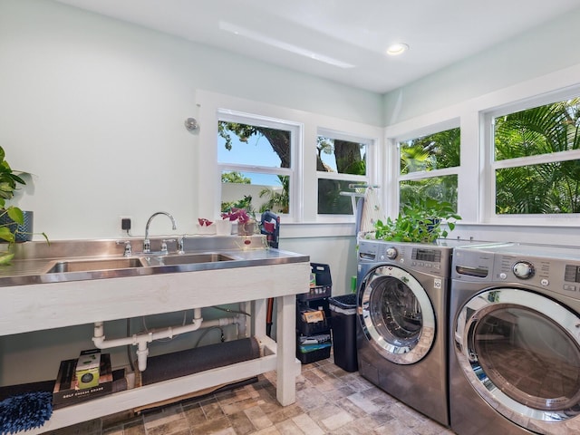 1732 6th St, Sarasota, FL 34236 - laundry room with washer and clothes dryer, light stone finish floors, and recessed lighting