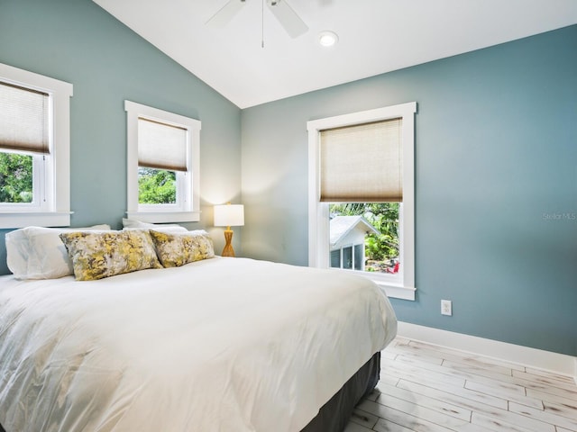 1732 6th St, Sarasota, FL 34236 - bedroom with multiple windows, lofted ceiling, a ceiling fan, wood finished floors, and recessed lighting