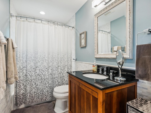 1732 6th St, Sarasota, FL 34236 - full bath featuring vanity, tile walls, and a shower with curtain