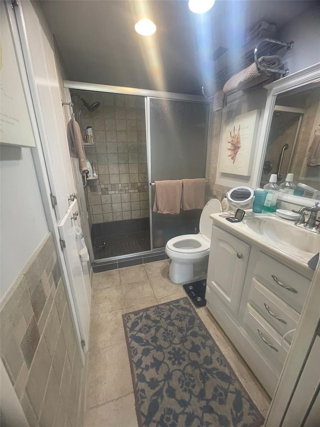 3806 Gulf Of Mexico Dr Unit C205, Longboat Key, FL 34228 - full bath with vanity, a stall shower, and tile patterned flooring