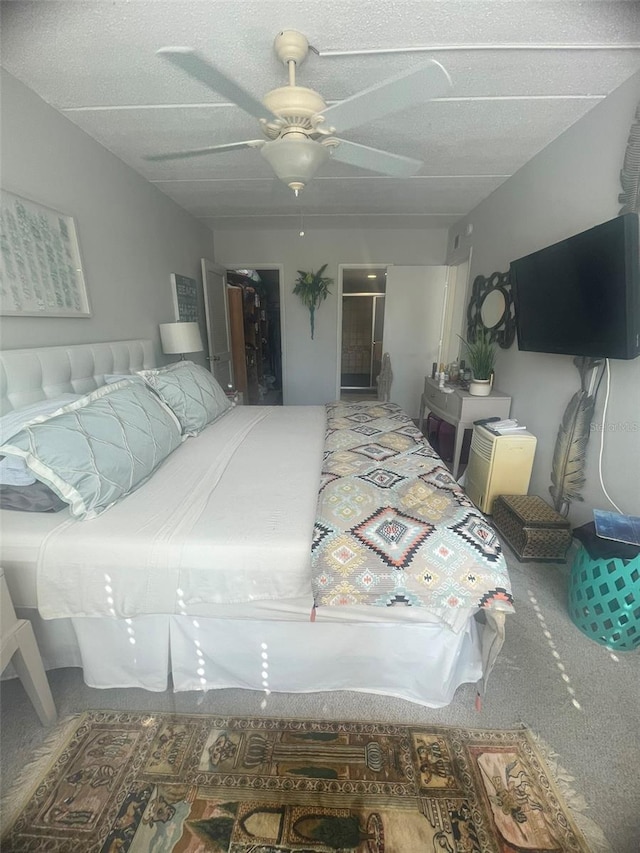 3806 Gulf Of Mexico Dr Unit C205, Longboat Key, FL 34228 - carpeted bedroom with a spacious closet, a closet, and ceiling fan