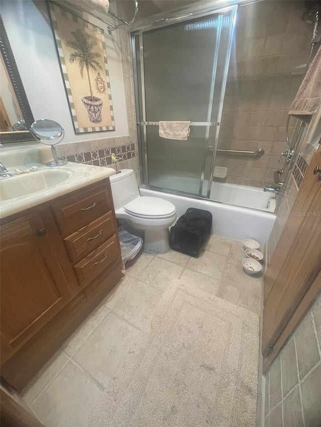 3806 Gulf Of Mexico Dr Unit C205, Longboat Key, FL 34228 - bathroom with vanity and bath / shower combo with glass door