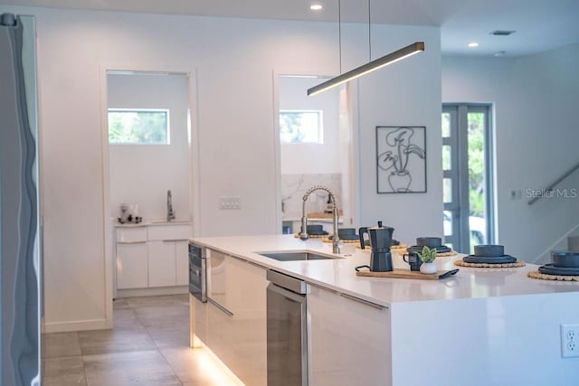 2124 Clematis Pl, Sarasota, FL 34239 - kitchen featuring modern cabinets, white cabinets, light countertops, recessed lighting, and fridge